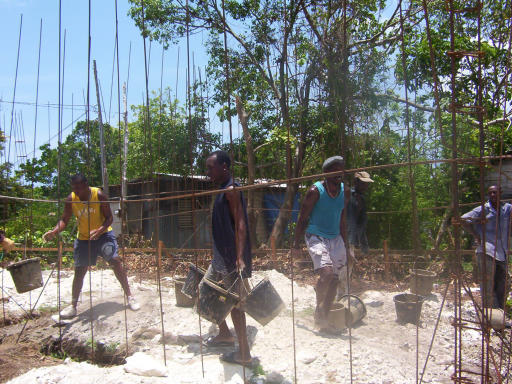 Pouring cement by hand