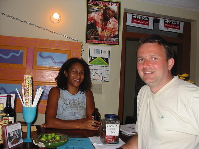 And in the next room at Sue McKenzie's famour world famous Easy Rock Internet Cafe Marcia serves David from the UK