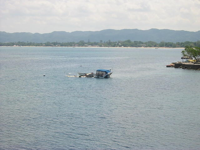 Williams boat sunk one day .. part of the learning about living with the elements of Negril!