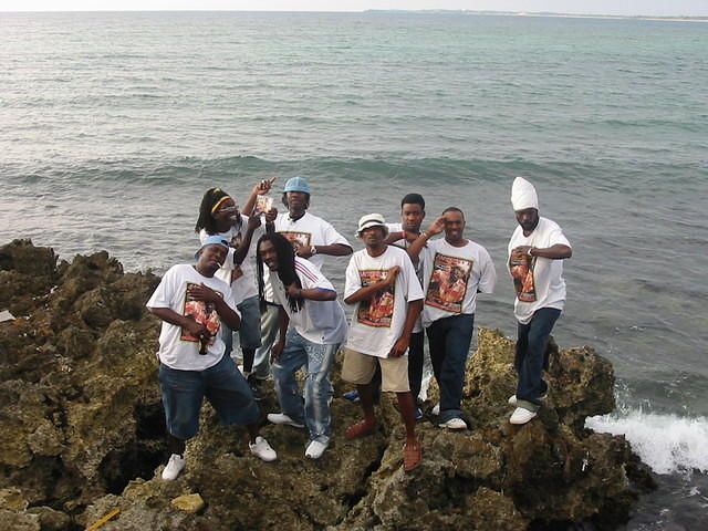 Anthony & his band pose for a few shots on the coral by the bar