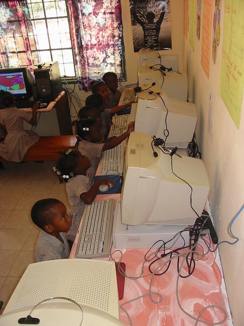 Four years old and look how serious they are working, Jamaica technicians, web masters & computer operators of the future fo
