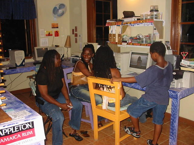 Local rasta women enjoy Easy Rock's Internet Services