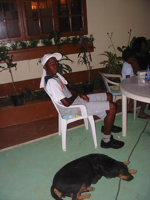 22's son Kemar & Dragon chill out (she has 3 three week old puppies but still finds her way down to the party!