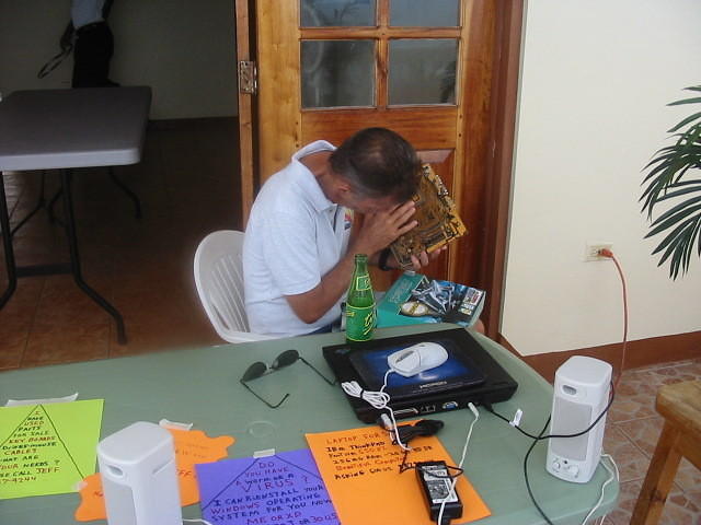 Jeff examines a motherboard