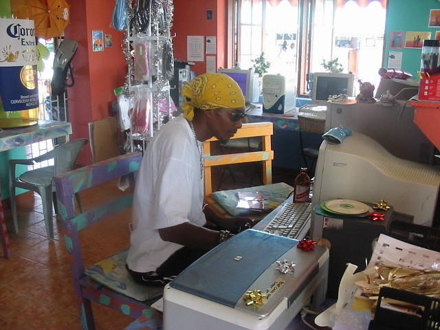 22 Pac (Rickey) inside Easy Rock burning some CD's