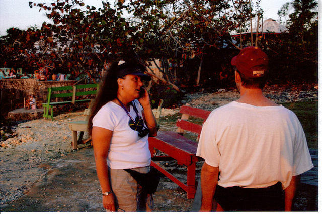 Abbey talking on cell phone.