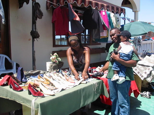 Tanya shows her lovely Italian Shoes to one JA Man