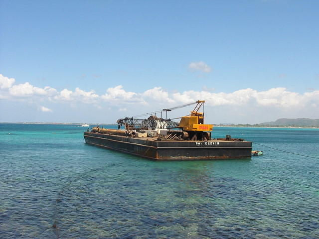 Williams barge arrived the day before to begin construction of the gas dock at Mary's Bay. The West End will never be the same w