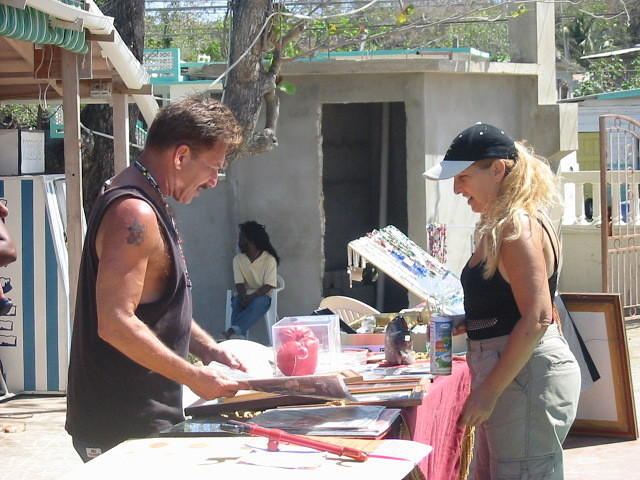 Susan (Blue Cave Castle) checks out Magic Man's wares