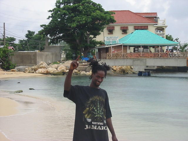 Clover, a local bar owner 'bigs up' the dock