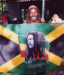 Benji with Reggae Ambassador flag - an honor bestowed by King Richard